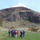 Deep Time Walk group in front of Arthur's Seat