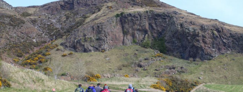 Deep Time Walk group in front of Arthur's Seat
